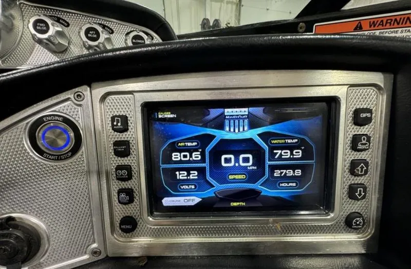 Slide: The Image of MasterCraft X46 2016 dashboard display showing engine and water temperature, speed, and voltage. - 20