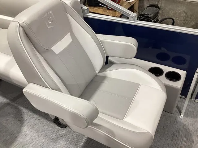 Slide: The Image of Luxury seating on 2025 Godfrey Xperience 2286 SBX boat with cup holders. - 10