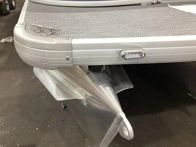 Slide: The Image of 2025 Godfrey Xperience 2286 SBX pontoon boat, detailed view of aluminum deck and pontoon. - 19