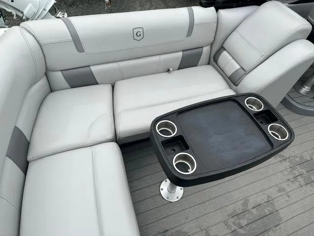 Slide: The Image of Luxurious seating on 2018 Godfrey Aqua Patio 259ULW Tri-Toon with table and cup holders. - 16