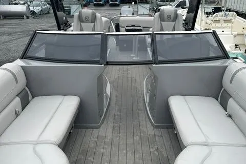 Slide: The Image of 2018 Godfrey Aqua Patio 259ULW Tri-Toon interior with gray seating and deck. - 8