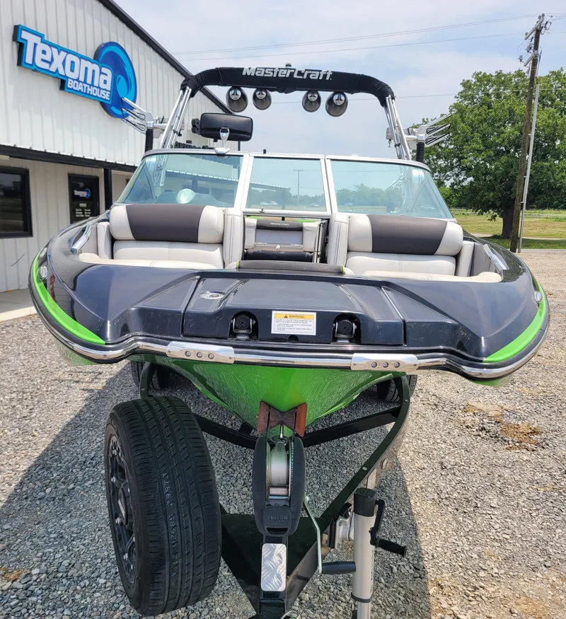Slide: The Image of 2012 MasterCraft X25 boat at Texoma Boathouse, front view. - 12