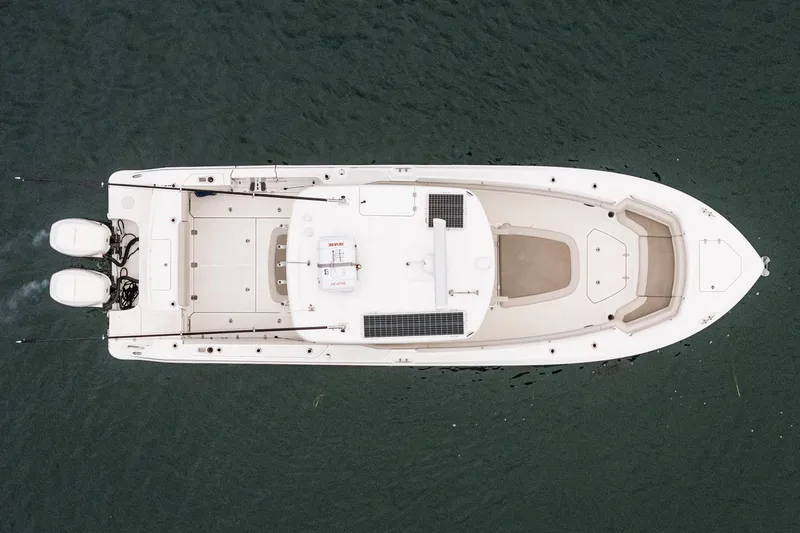 Slide: The Image of Aerial view of 2019 Boston Whaler 330 Outrage boat on water. - 42