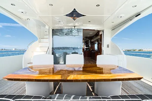 Slide: The Image of Luxurious 2004 Marquis yacht interior with elegant dining area and ocean view. - 14
