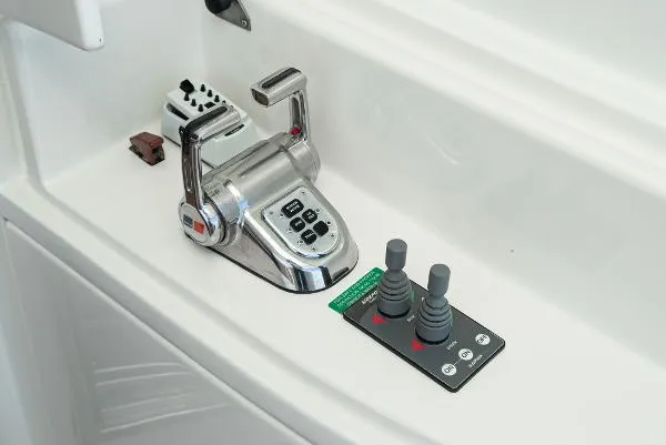 Slide: The Image of Boat control panel with levers and buttons, Marquis 2004 model. - 16