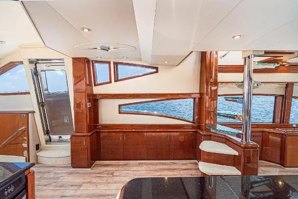 Slide: The Image of Luxurious 2004 Marquis yacht interior with elegant wood finishes and modern design. - 26