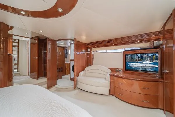 Slide: The Image of Luxurious 2004 Marquis yacht interior with elegant wood finishes and modern amenities. - 30