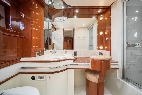 Slide: The Image of Luxurious 2004 Marquis yacht bathroom with elegant wood finishes and modern fixtures. - 32