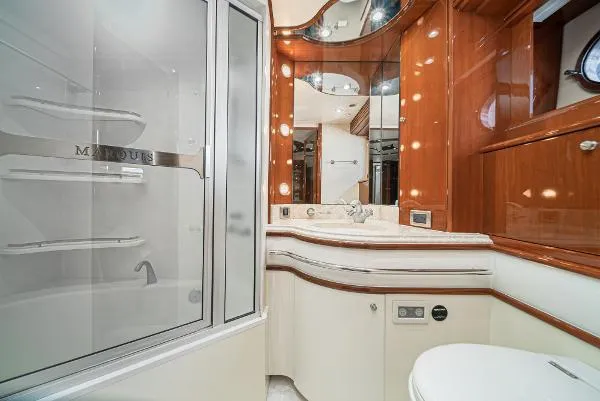 Slide: The Image of Luxurious 2004 Marquis yacht bathroom with elegant wood finishes and modern fixtures. - 34