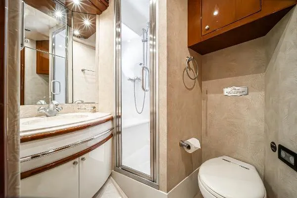 Slide: The Image of Luxurious 2004 Marquis yacht bathroom with shower, sink, and toilet. - 39