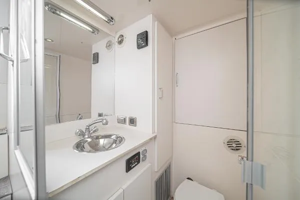 Slide: The Image of Modern bathroom in 2004 Marquis yacht with sleek sink and mirror. - 41