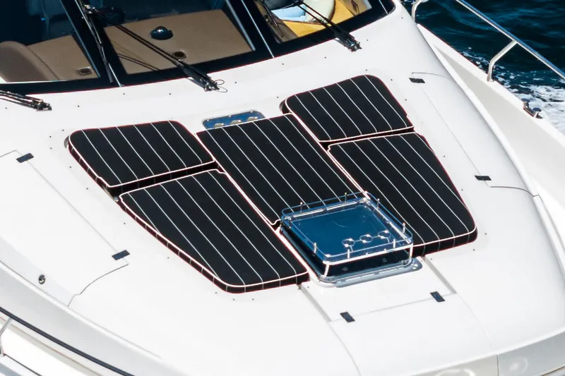 Slide: The Image of 2004 Marquis yacht with solar panels on deck, cruising on blue water. - 49