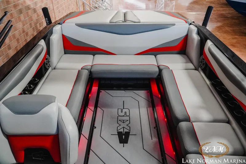 Slide: The Image of 2020 Axis T23 boat interior with red and gray seating at Lake Norman Marina. - 15