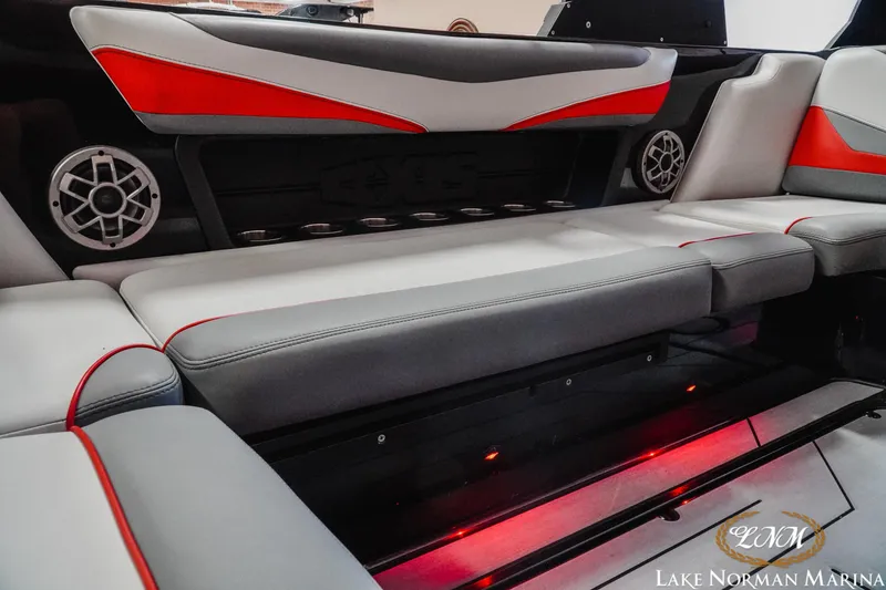 Slide: The Image of 2020 Axis T23 boat interior with stylish seating and speaker system. - 17