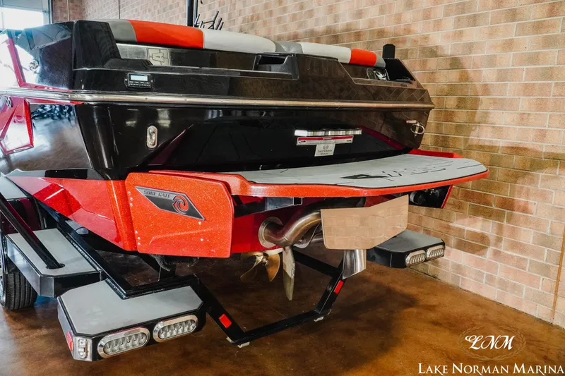Slide: The Image of 2020 Axis T23 boat on trailer at Lake Norman Marina. - 7