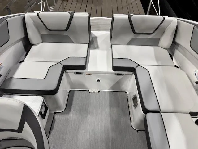 Slide: The Image of 2025 Yamaha Boats AR220 interior with sleek, modern seating design. - 10