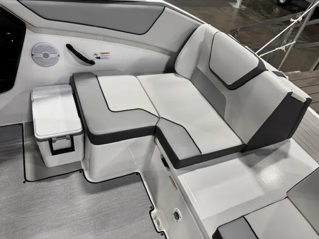 Slide: The Image of 2025 Yamaha Boats AR220 interior seating with modern design and comfortable upholstery. - 11