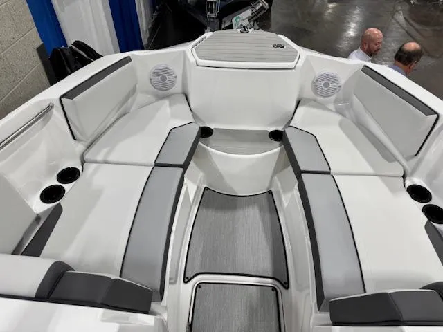 Slide: The Image of 2025 Yamaha Boats AR220 interior with spacious seating and modern design. - 2