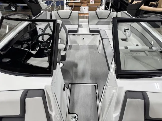 Slide: The Image of 2025 Yamaha Boats AR220 interior, featuring sleek seating and modern design elements. - 3