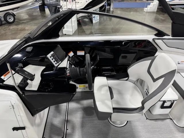 Slide: The Image of 2025 Yamaha Boats AR220 cockpit with modern controls and comfortable seating. - 5