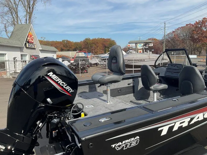 Slide: The Image of 2025 Tracker Targa V-18 WT boat with Mercury engine at dealership. - 14