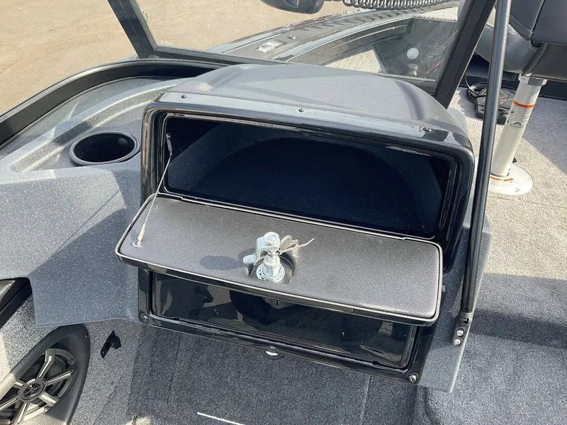 Slide: The Image of 2025 Tracker Targa™ V-18 WT boat interior with open storage compartment. - 32