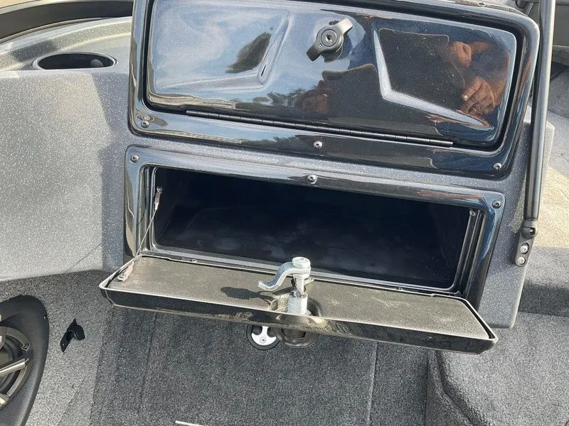 Slide: The Image of 2025 Tracker Targa™ V-18 WT boat storage compartment with open hatch. - 33