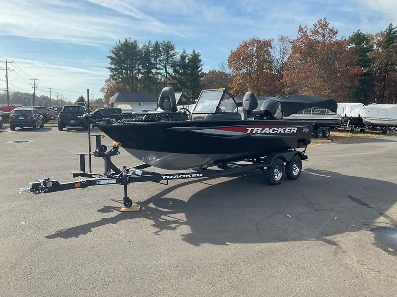 Slide: The Image of 2025 Tracker Targa™ V-18 WT boat on trailer in parking lot. - 4