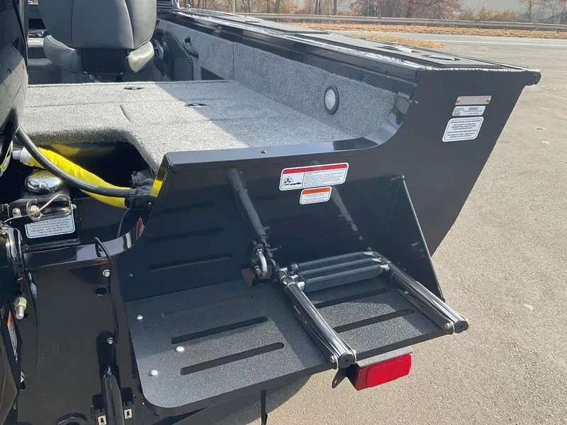 Slide: The Image of 2025 Tracker Targa™ V-18 WT boat with foldable ladder and spacious interior. - 42