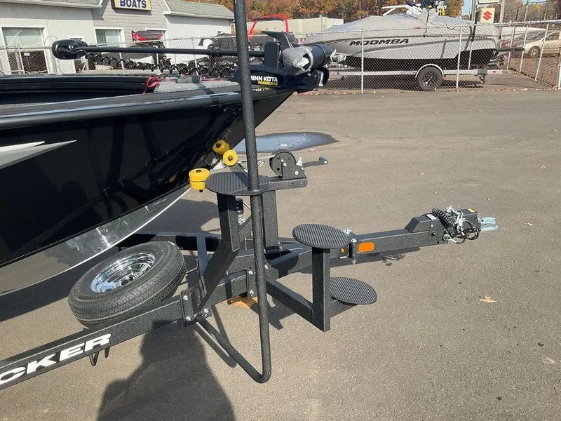 Slide: The Image of 2025 Tracker Targa™ V-18 WT boat trailer with spare tire and step ladder. - 49