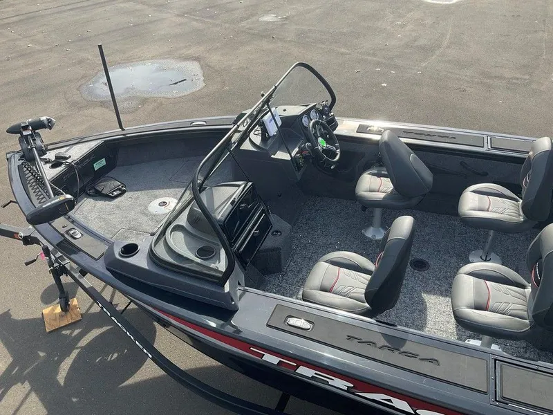 Slide: The Image of 2025 Tracker Targa™ V-18 WT boat interior with seating and steering console. - 8