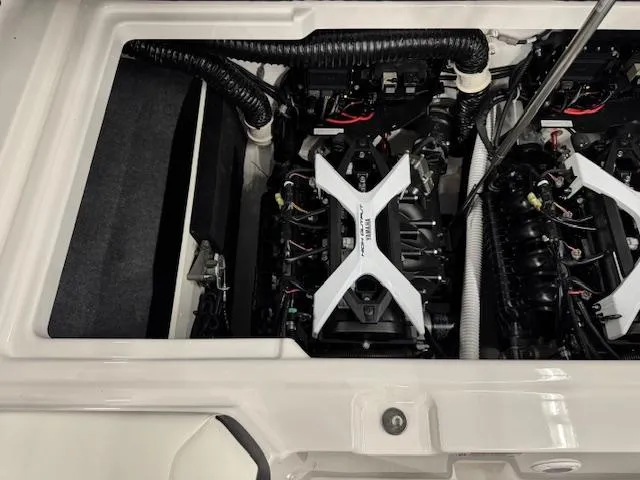 Slide: The Image of 2025 Yamaha Boats 222S engine compartment showcasing dual engines and components. - 14