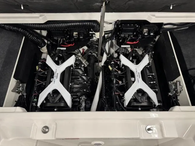 Slide: The Image of 2025 Yamaha Boats 222S engine compartment with dual engines and advanced components. - 15