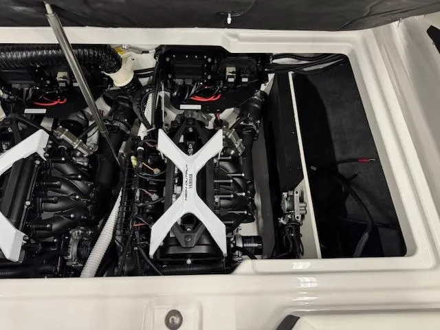 Slide: The Image of 2025 Yamaha Boats 222S engine compartment showcasing dual engines and mechanical components. - 16