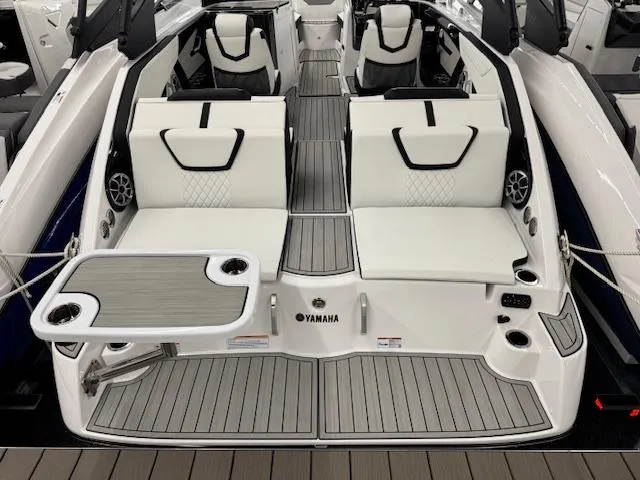 Slide: The Image of 2025 Yamaha Boats 222S interior with sleek seating and modern design. - 18
