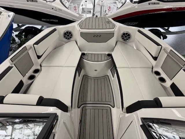 Slide: The Image of 2025 Yamaha Boats 222S interior with sleek seating and modern design. - 2