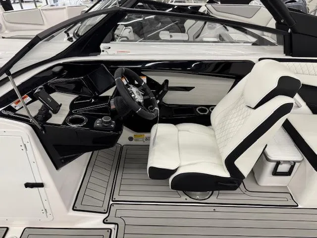 Slide: The Image of 2025 Yamaha Boats 222S cockpit with sleek black and white interior design. - 5