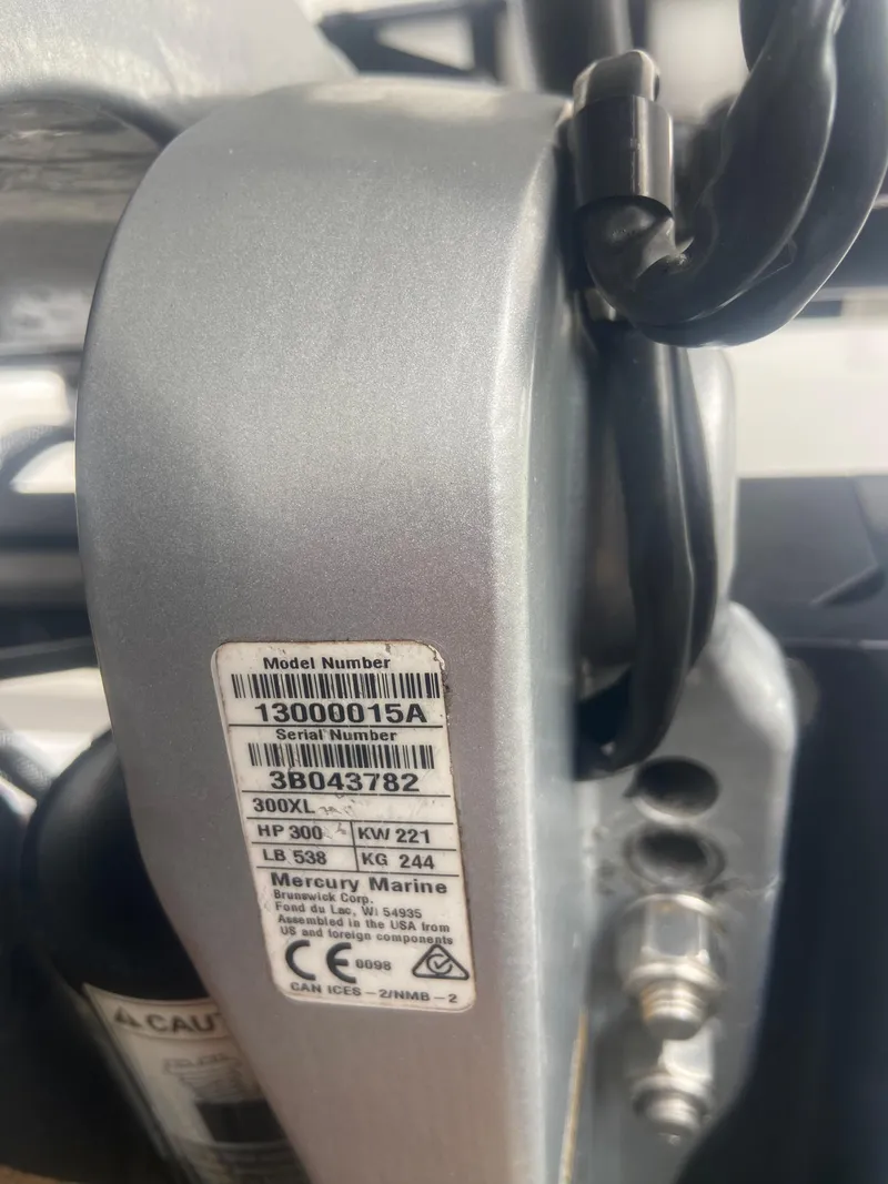 Slide: The Image of Close-up of a Mercury Marine engine label on a Paramount 21, 1987 model. - 31