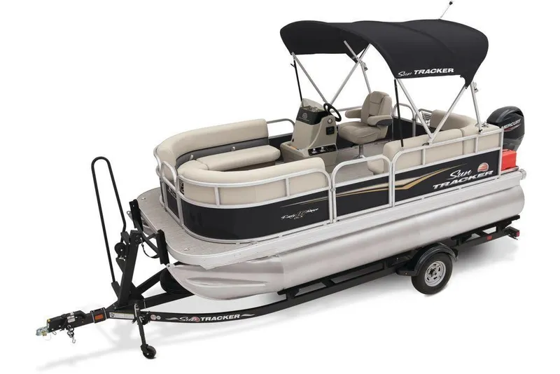 Slide: The Image of 2025 Sun Tracker PARTY BARGE® 16 DLX pontoon boat on trailer, featuring canopy and seating. - 3