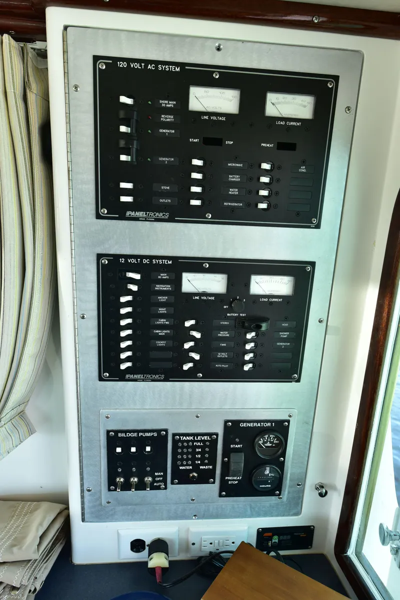 Slide: The Image of Electrical control panel on a 1998 Duffy 35 Downeast Cruiser boat. - 35