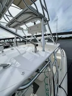 Slide: The Image of 2001 Intrepid 366 Cuddy boat with sleek design and sturdy structure. - 13