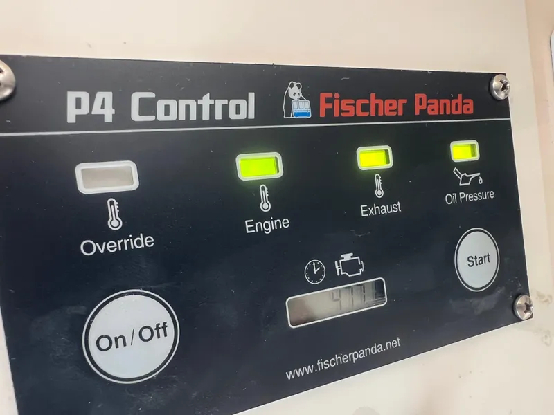 Slide: The Image of Fischer Panda P4 Control panel on 2001 Intrepid 366 Cuddy boat. - 32