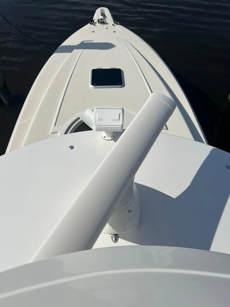 Slide: The Image of Top view of 2001 Intrepid 366 Cuddy boat deck on water. - 34