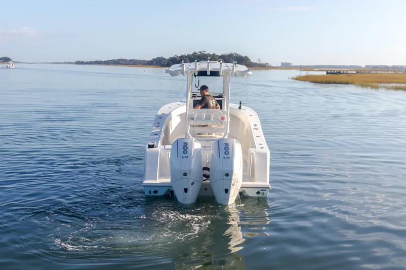 The Image of 2023 Pair Customs 25 Center Console boat on calm water. - 1