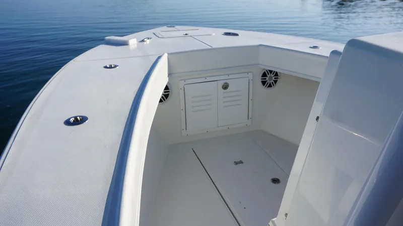 Slide: The Image of 2023 Pair Customs 25 Center Console boat interior on calm water. - 9