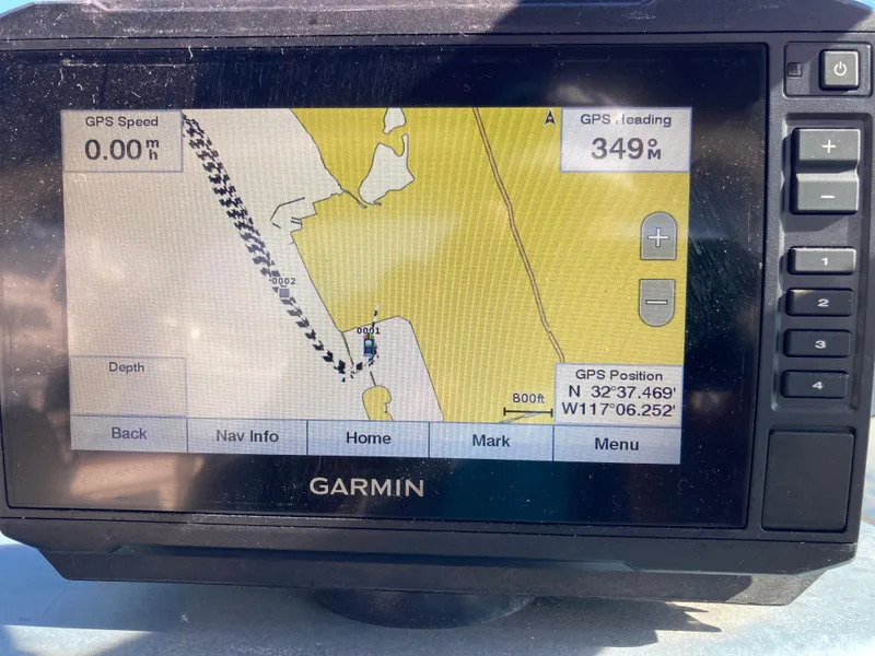 Slide: The Image of Garmin GPS display on 1986 Sea Ray 340 Express Cruiser, showing navigation map and coordinates. - 37