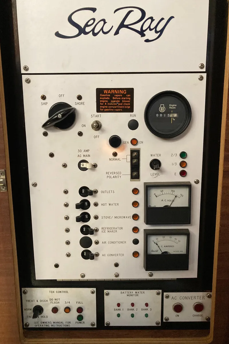 Slide: The Image of Control panel of a 1986 Sea Ray 340 Express Cruiser boat. - 41
