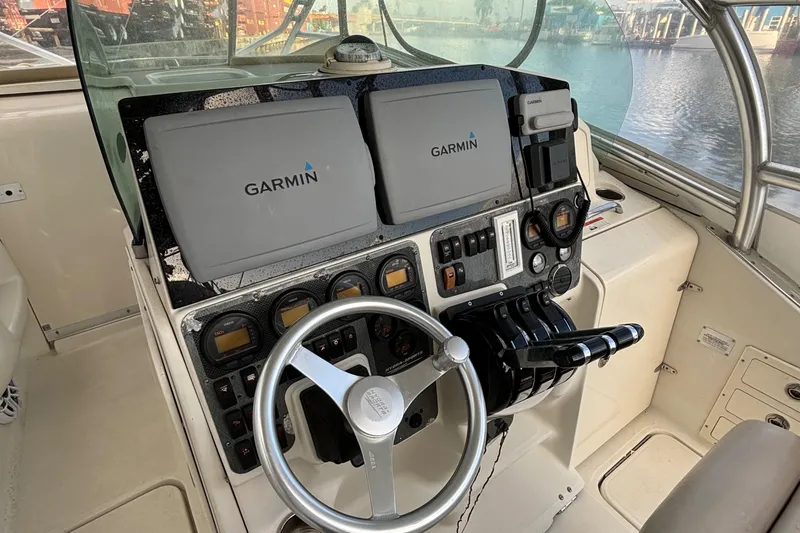 Slide: The Image of 2004 Hydra-Sports Vector 3300 VX boat cockpit with Garmin navigation system. - 5