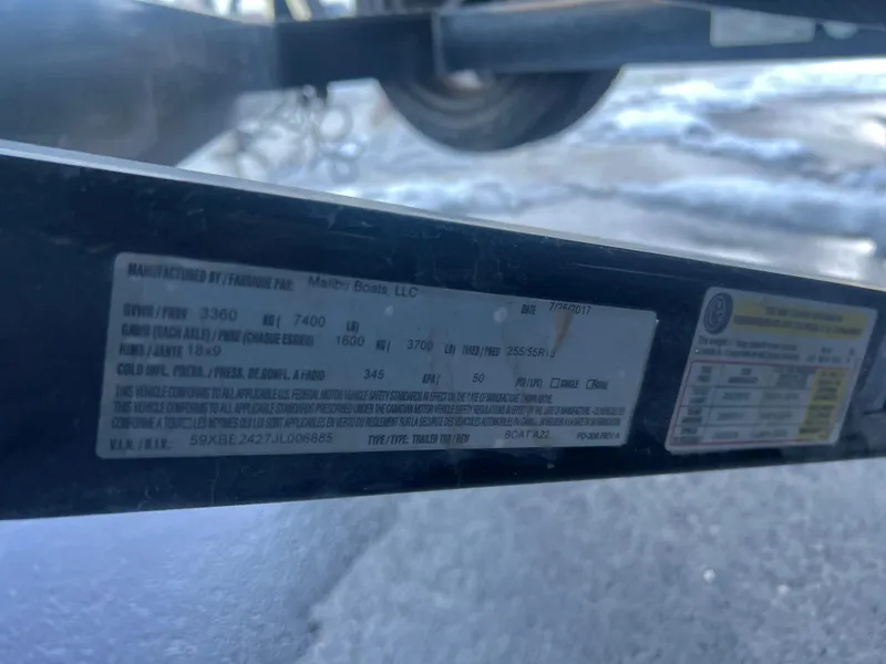 Slide: The Image of 2018 Axis Boats A22 trailer label with specifications and compliance details. - 18