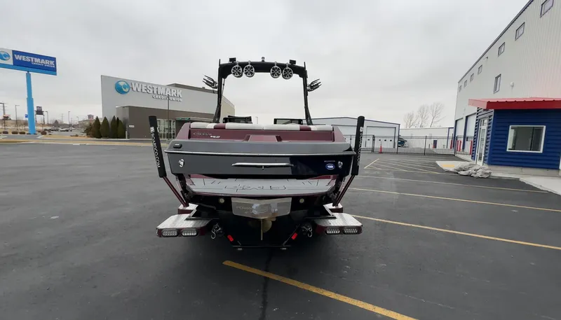 Slide: The Image of 2018 Axis Boats A22 in parking lot near Westmark Credit Union. - 8